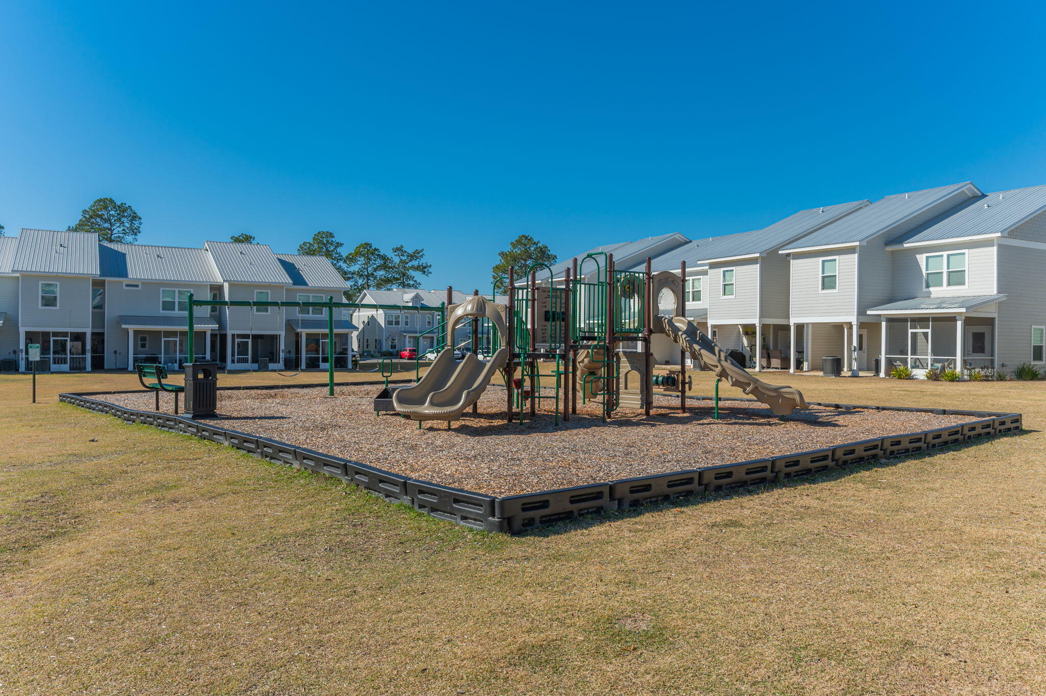 275 North Sand Palm Road, Unit 167VISTA Freeport, FL 32439 - Photo 40 of 40 a view of a house with swimming pool and sitting area