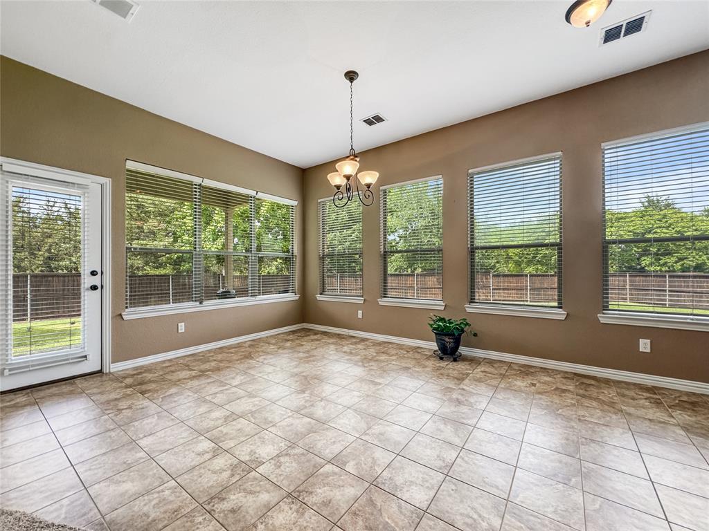 401 Varnum Way Fairview, TX 75069 - Photo 7 of 33 a view of an empty room with windows