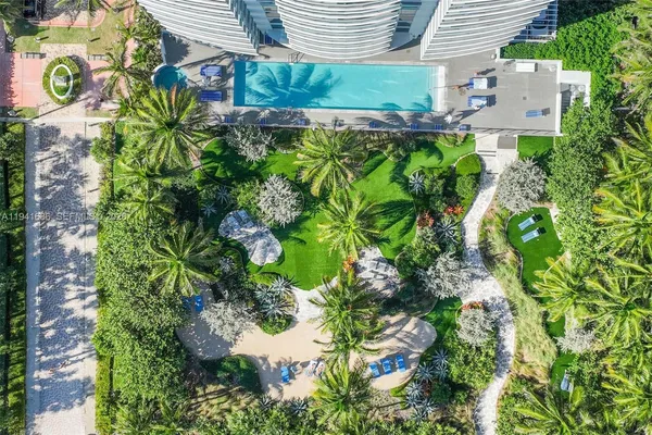 a view of a house with swimming pool