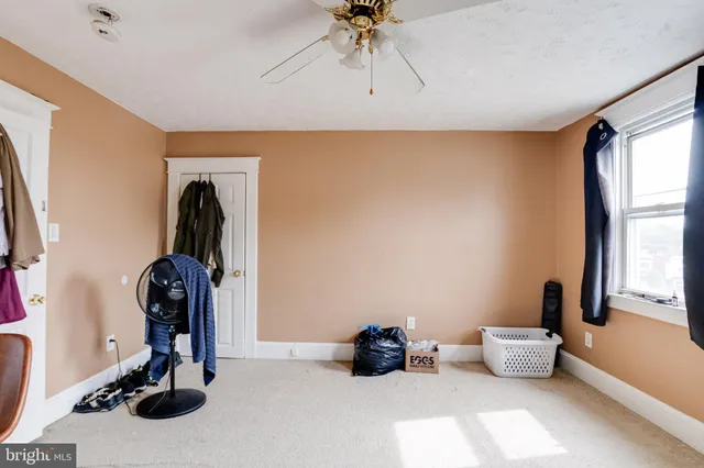 a workspace with furniture and wooden floor