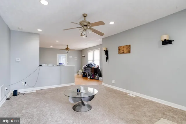a bed room with furniture and a window