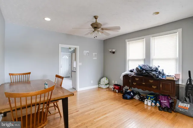 a kitchen with a refrigerator and cabinets
