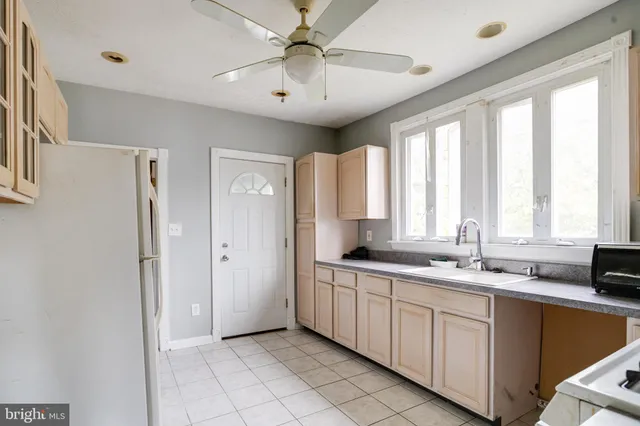 a bathroom with a bathtub and a sink
