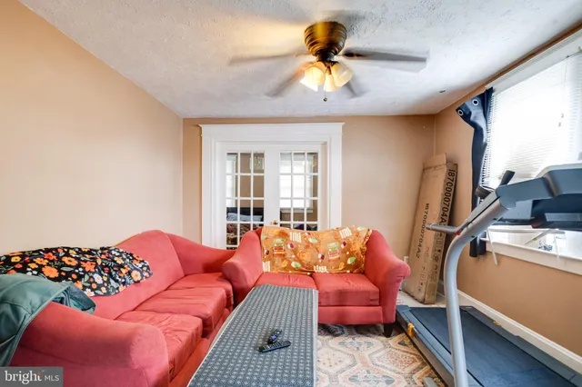 a utility room with closet dryer and washer