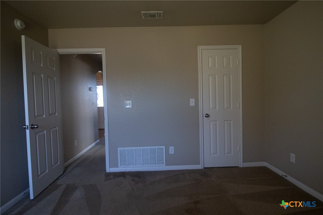 217 Pointer Street Nolanville, TX 76559 - Photo 29 of 29 a view of hallway with wooden floor