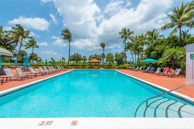 a view of an chairs and tables in the patio