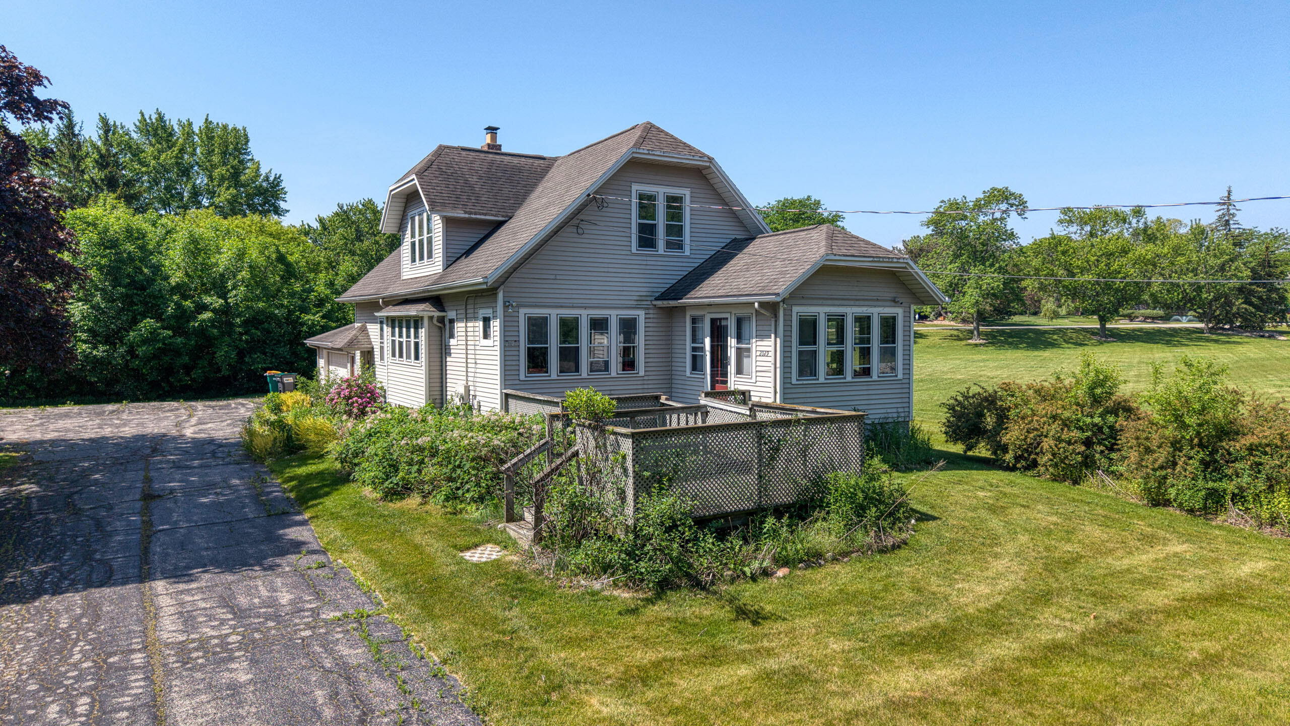2029 West Donges Bay Road, Unit 2031 Mequon, WI 53092 - Photo 59 of 68 Front of Duplex
