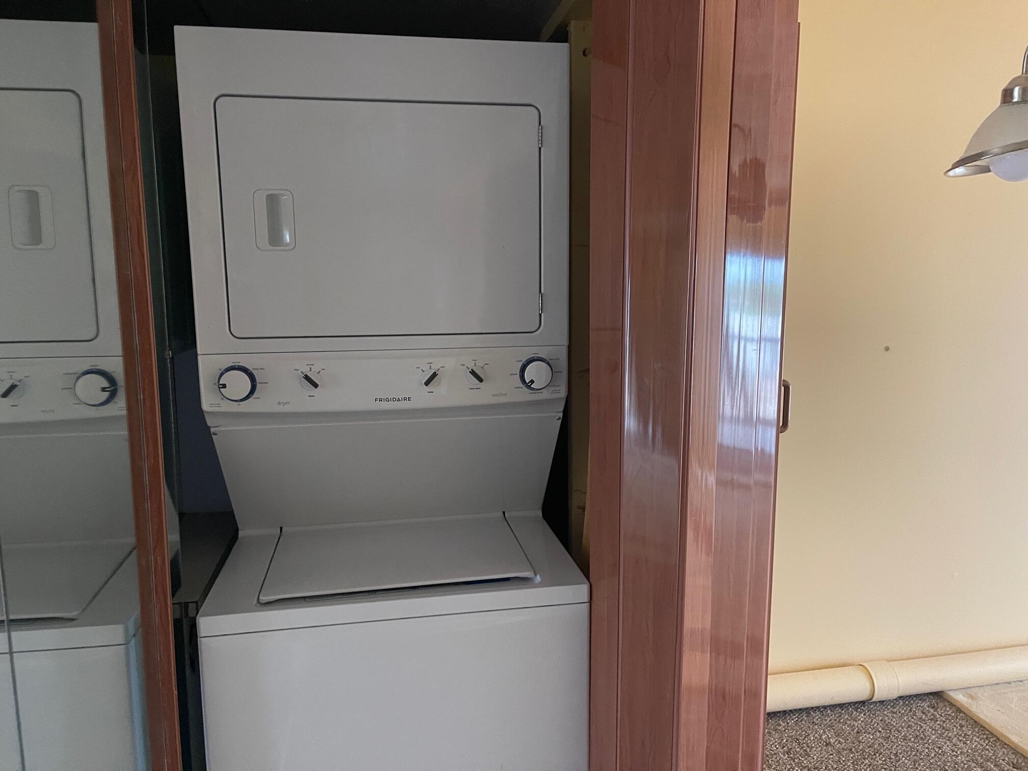 4100 Tivoli Court, Unit 201 Lake Worth, FL 33467 - Photo 5 of 5 a utility room with dryer and washer