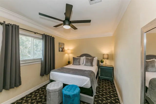 a bathroom with a sink a toilet and shower curtain