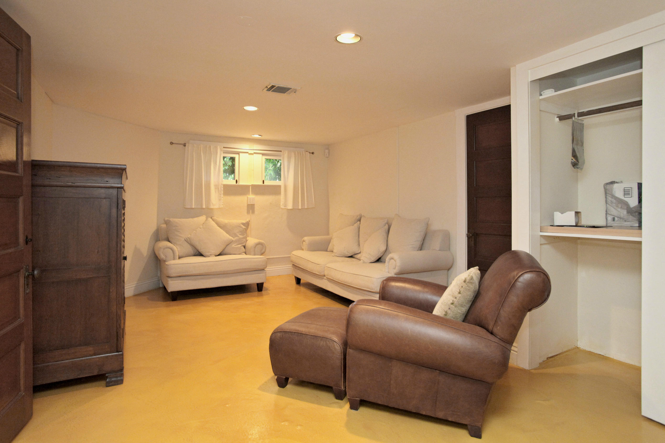 60 Olive Mill Road Santa Barbara, CA 93108 - Photo 14 of 15 a living room with furniture and a wooden floor