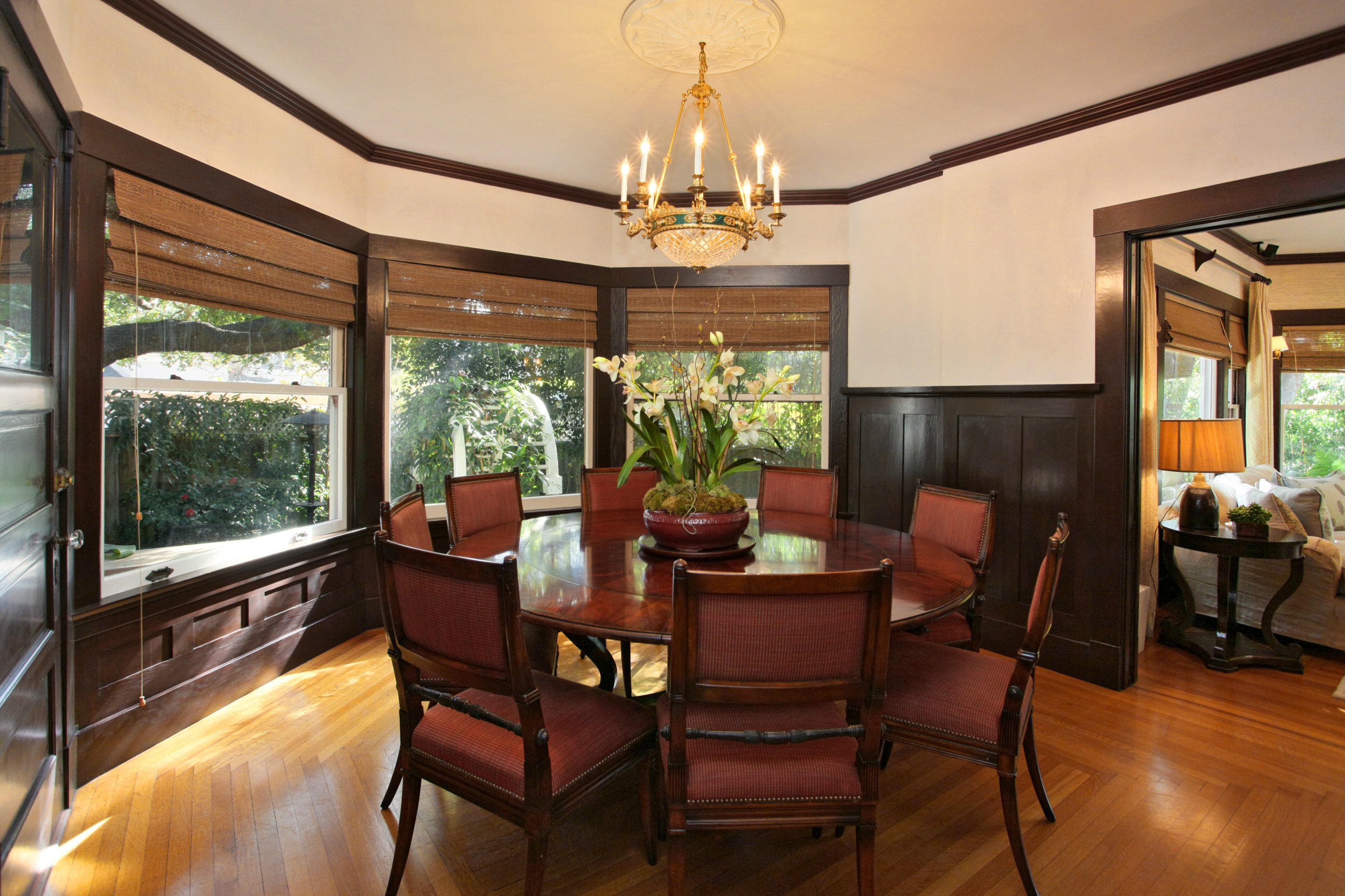 60 Olive Mill Road Santa Barbara, CA 93108 - Photo 2 of 15 a dining room with furniture a chandelier and wooden floor