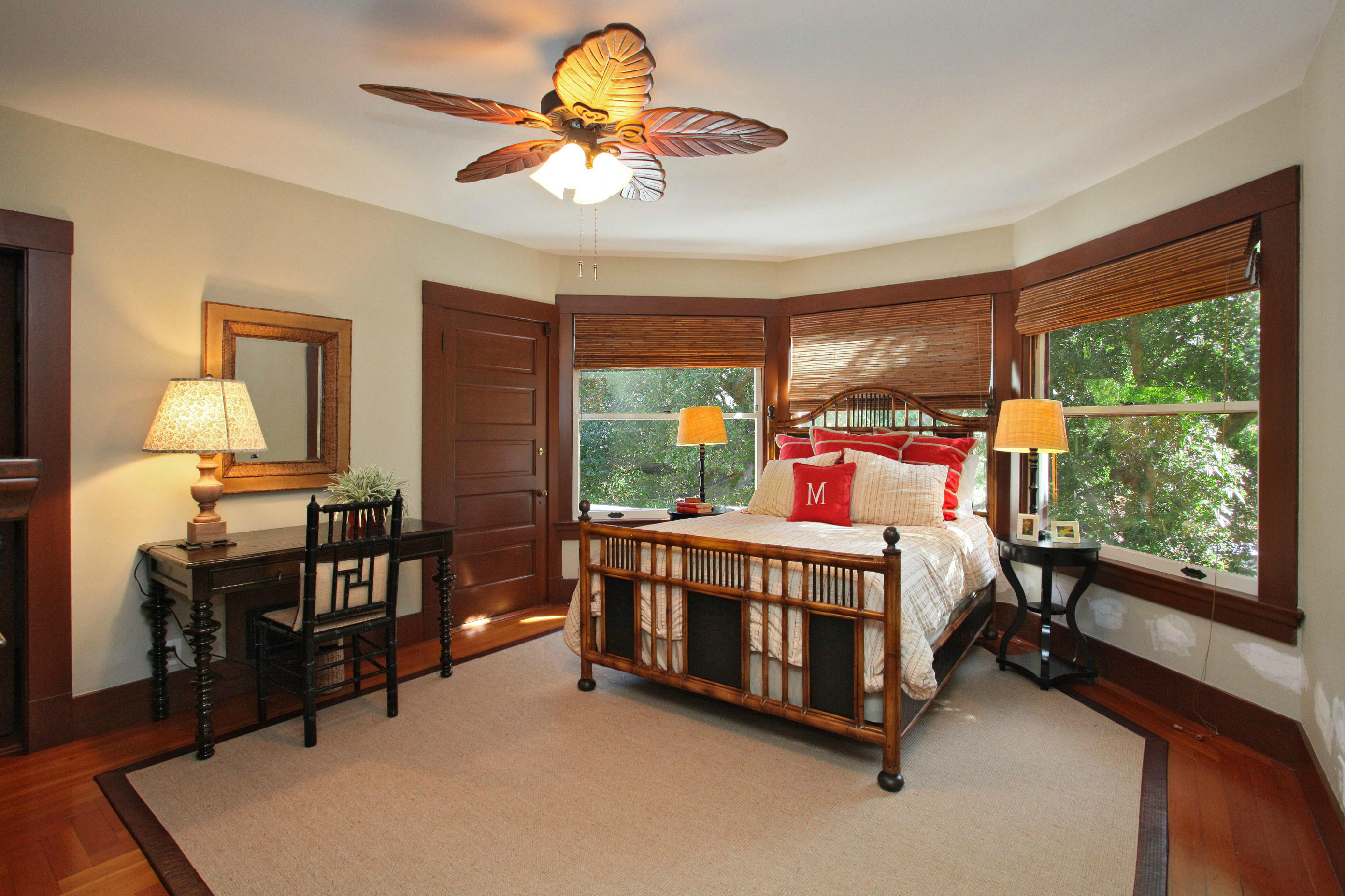 60 Olive Mill Road Santa Barbara, CA 93108 - Photo 7 of 15 a bedroom with a bed and a chandelier