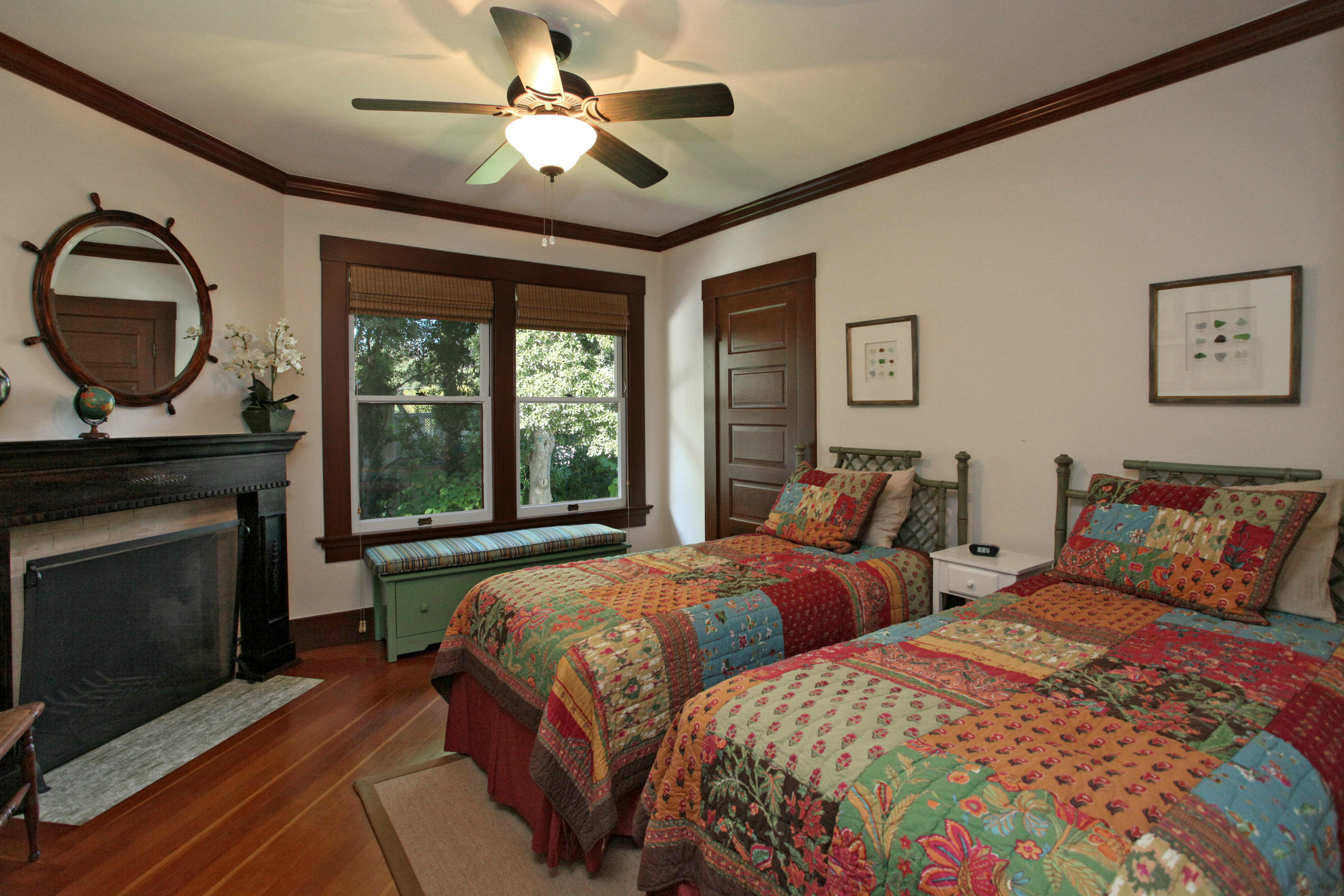 60 Olive Mill Road Santa Barbara, CA 93108 - Photo 8 of 15 a bedroom with two beds and a fireplace