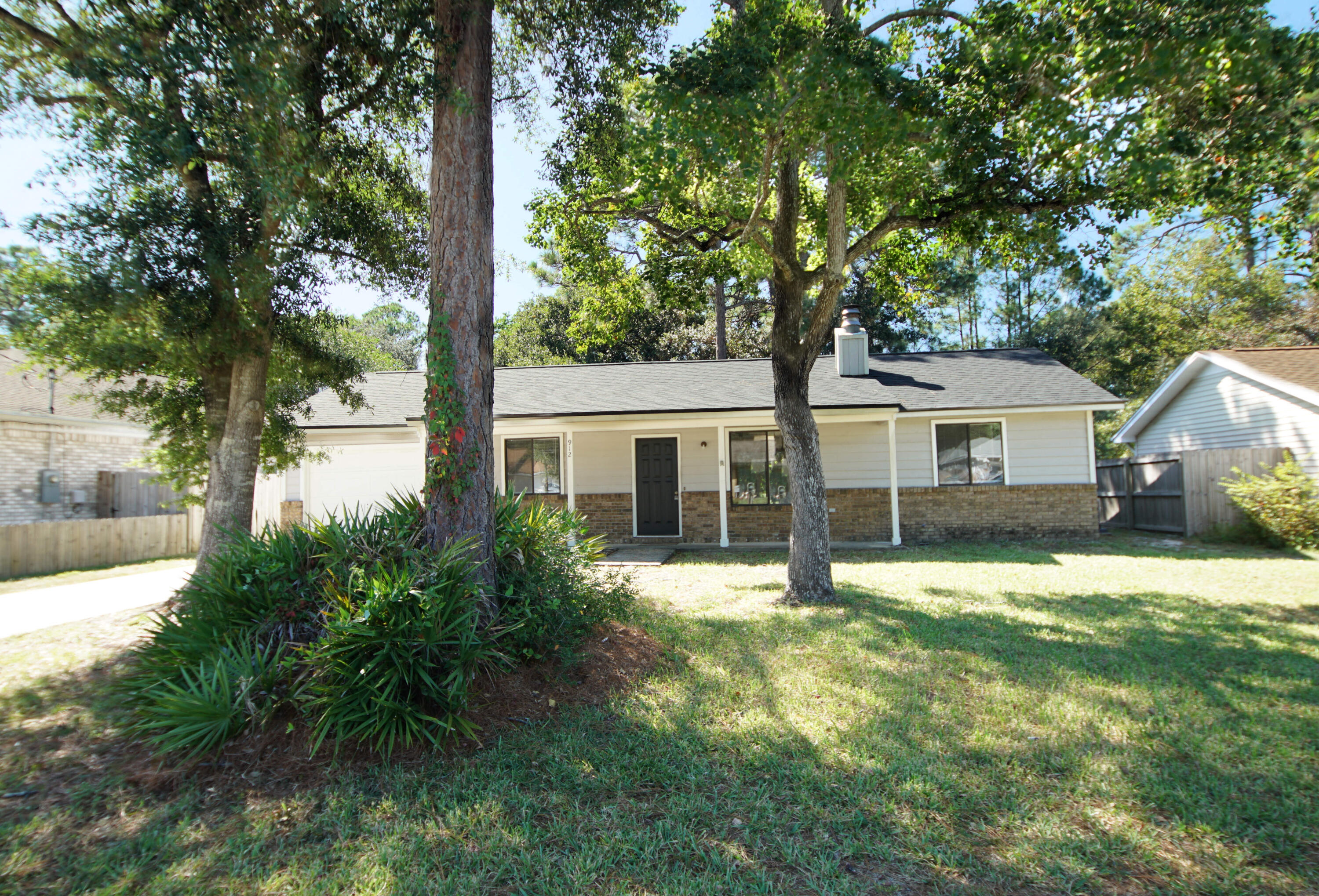 912 Nutmeg Avenue Niceville, FL 32578 - Photo 2 of 30 a front view of house with yard and green space