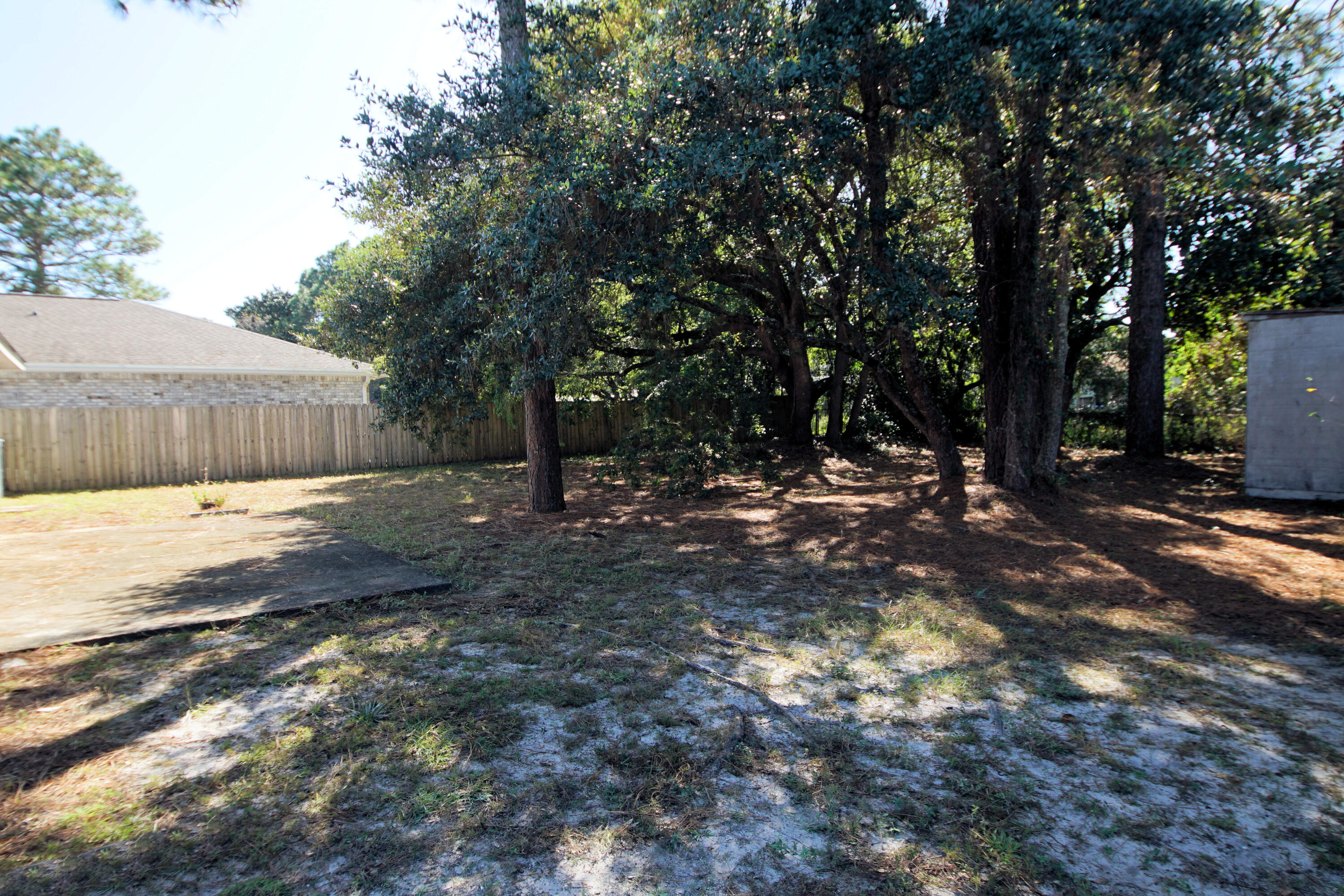 912 Nutmeg Avenue Niceville, FL 32578 - Photo 29 of 30 a view of backyard with green space