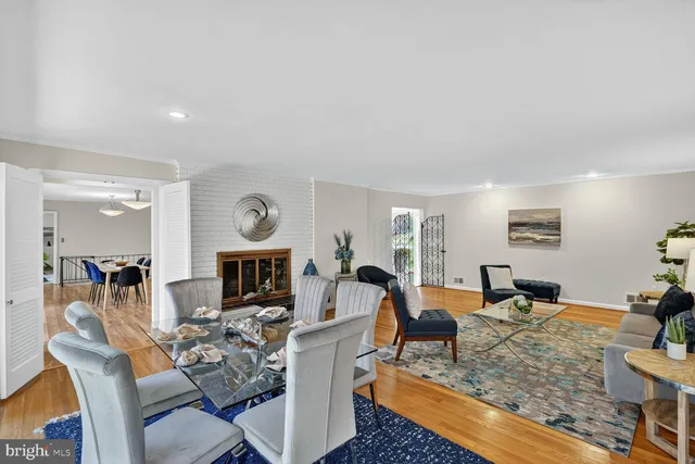 a living room with fireplace furniture and furniture