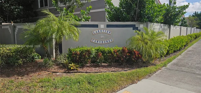 a sign on the side of the road