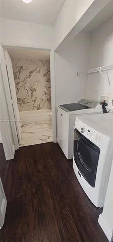 a view of utility room with washer and dryer