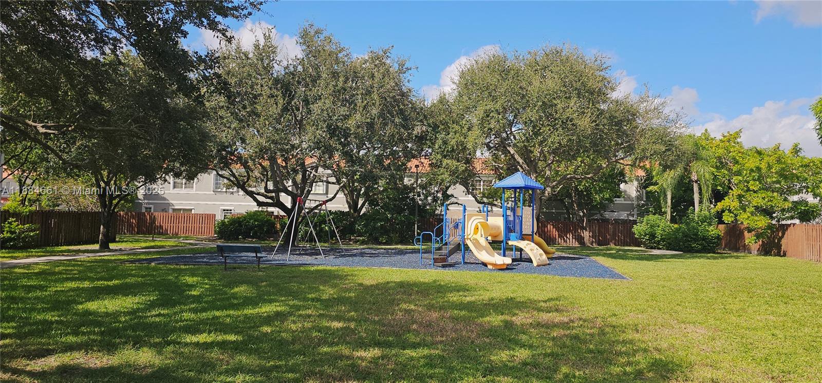8372 Southwest 23rd Court Miramar, FL 33025 - Photo 22 of 22 a view of a park with swings and slides