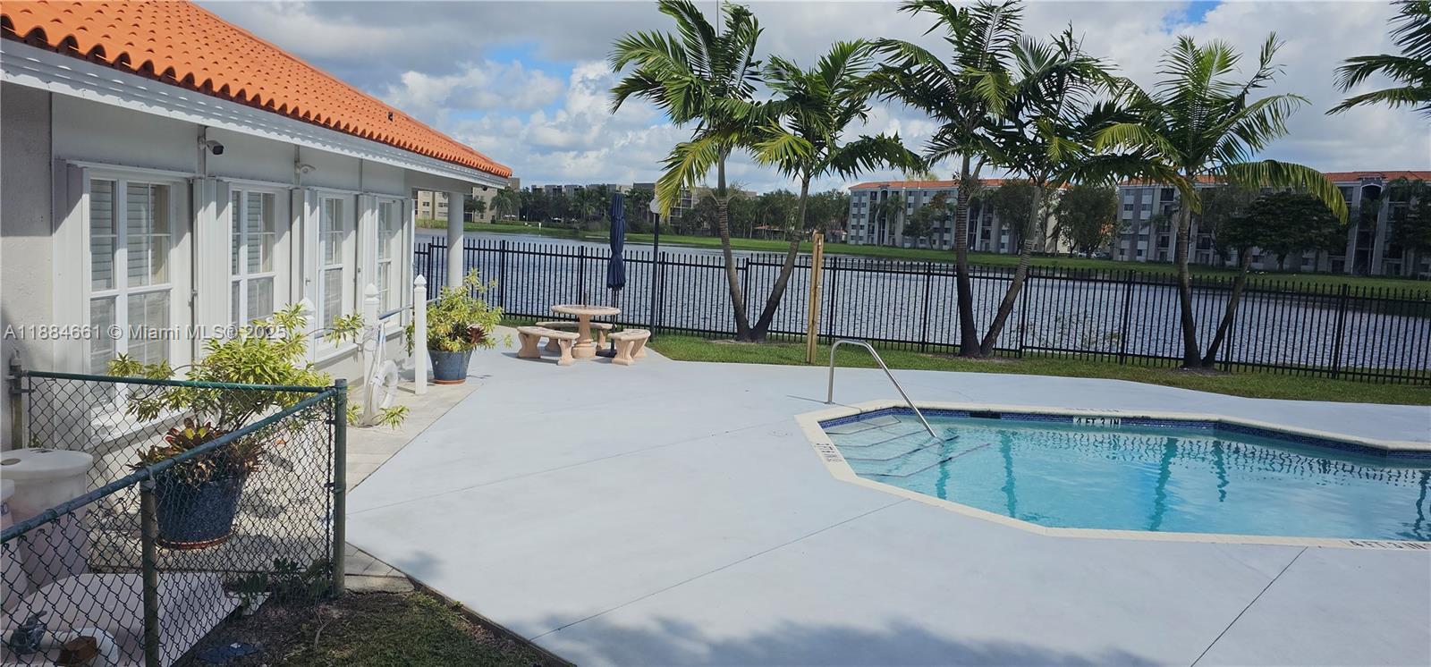 8372 Southwest 23rd Court Miramar, FL 33025 - Photo 5 of 22 a view of a swimming pool with a patio