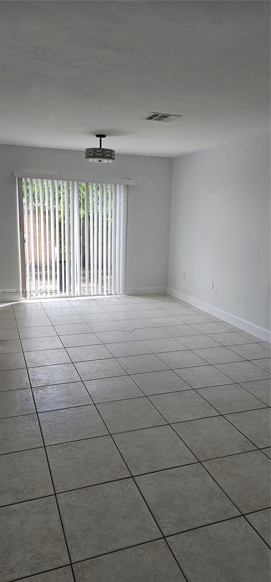 8372 Southwest 23rd Court Miramar, FL 33025 - Photo 7 of 22 a view of an empty room with a window