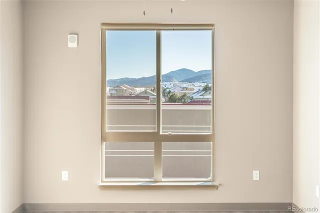 a view of a livingroom with a large window