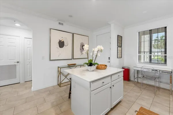 a kitchen with a stove and a sink