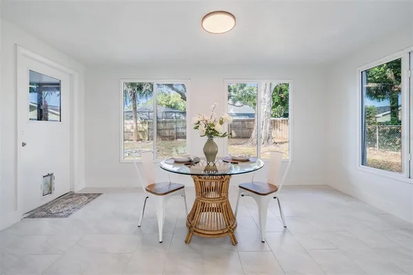 a view of an empty room with a large window