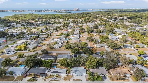 an aerial view of a city with lots of residential buildings