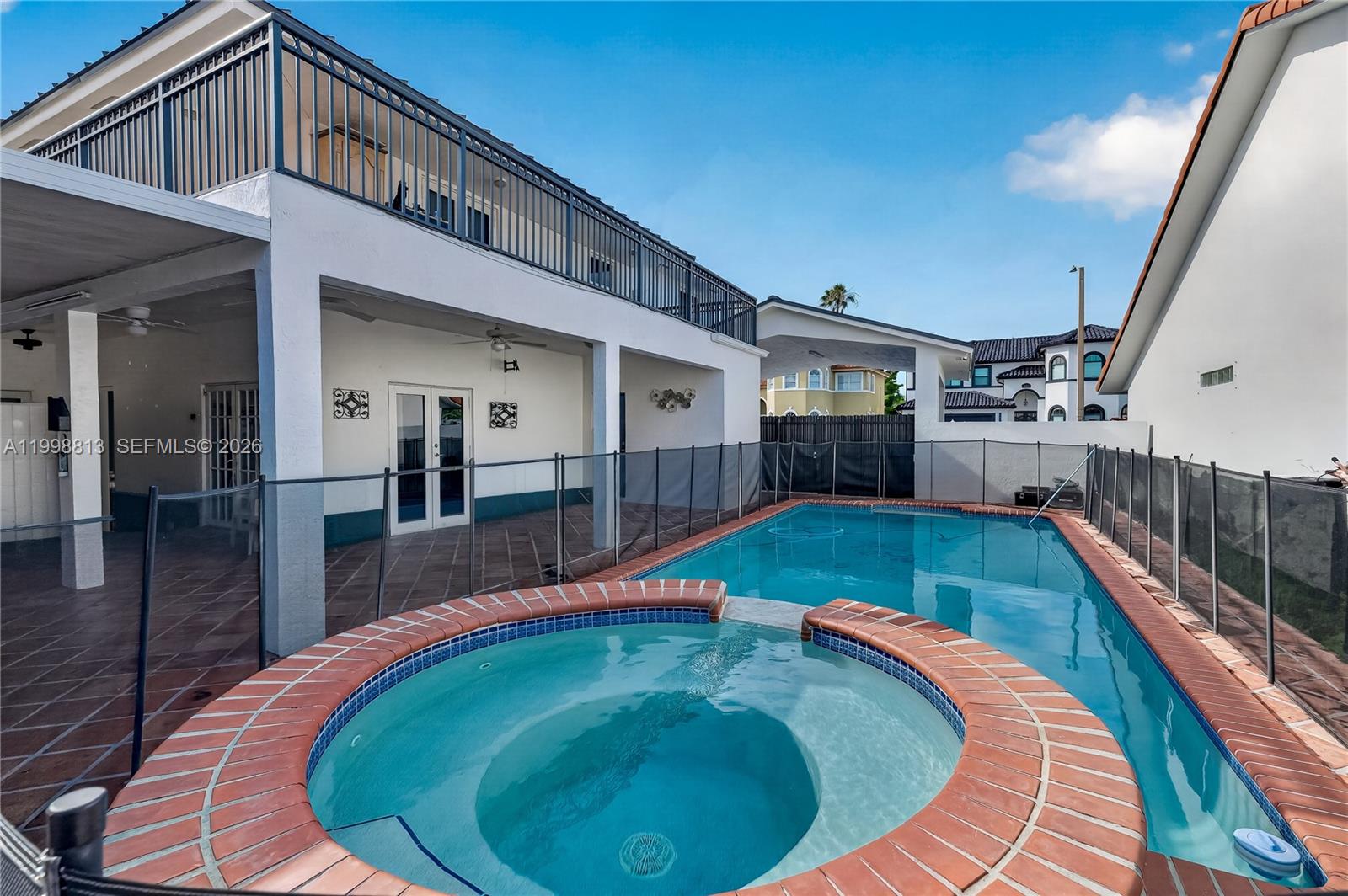10140 Southwest 26th Terrace Miami, FL 33165 - Photo 33 of 70 a swimming pool with outdoor seating yard and barbeque oven