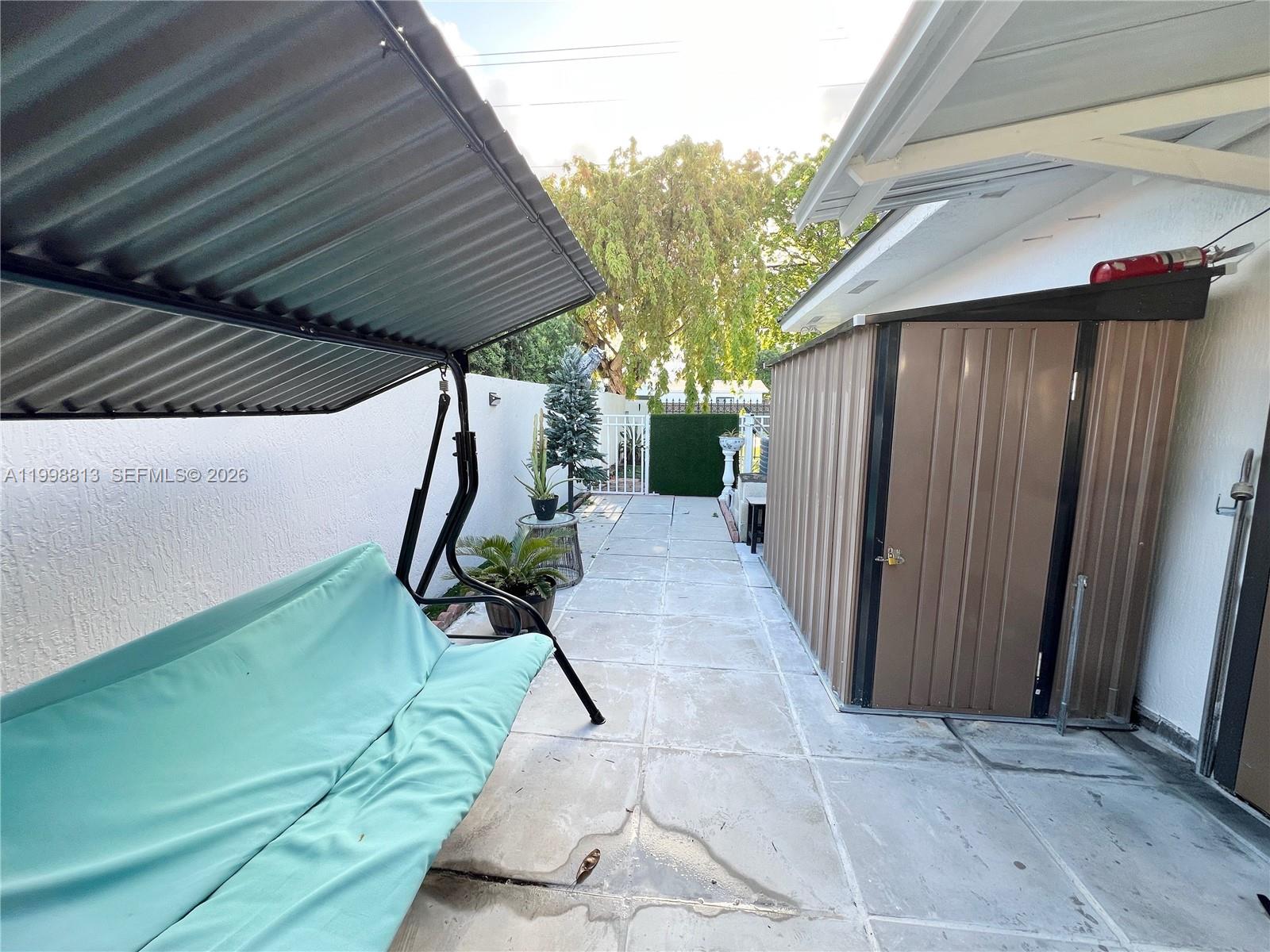 10140 Southwest 26th Terrace Miami, FL 33165 - Photo 45 of 70 a view of outdoor space and deck