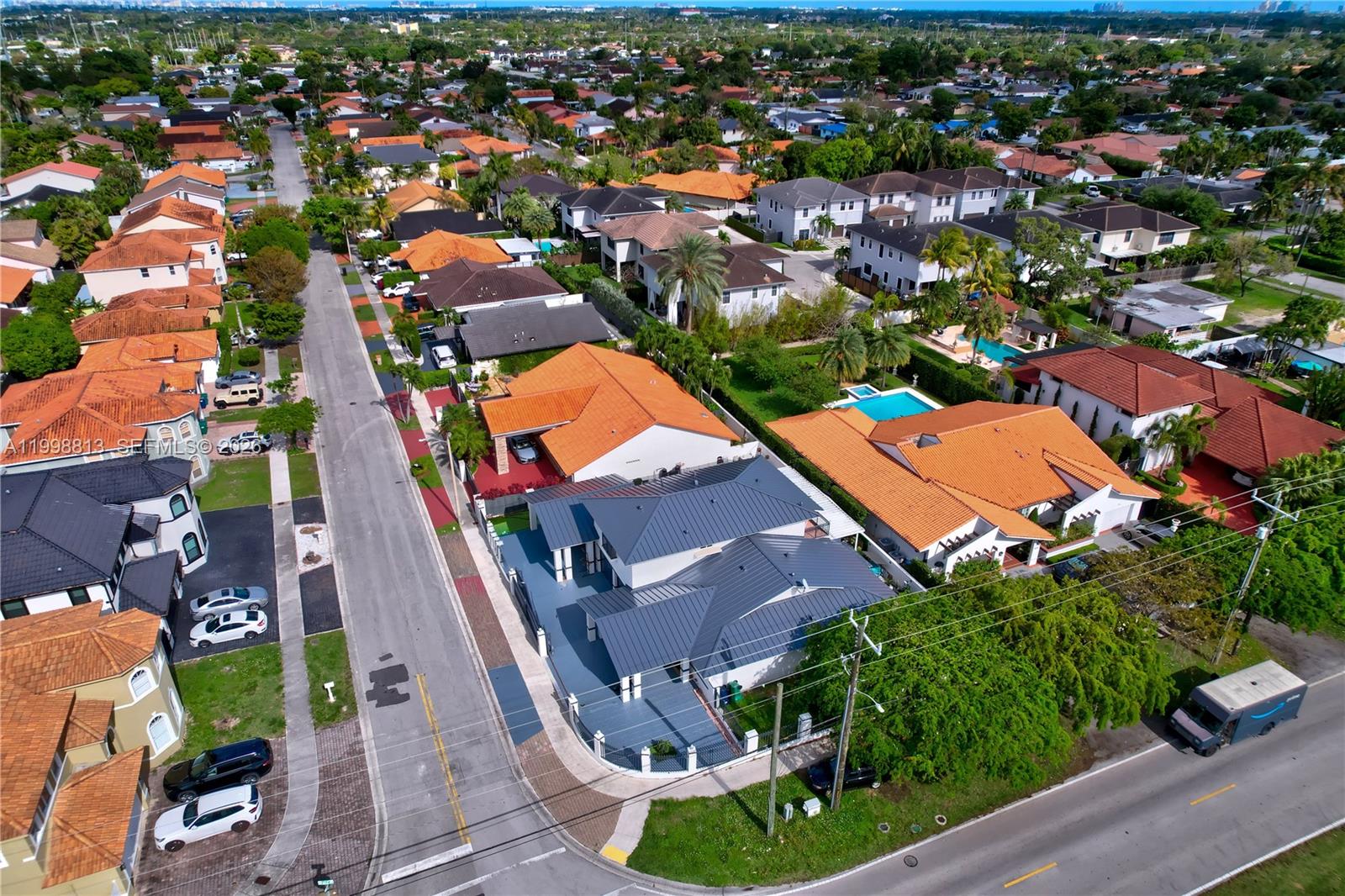 10140 Southwest 26th Terrace Miami, FL 33165 - Photo 54 of 70 an aerial view of residential houses with outdoor space and swimming pool