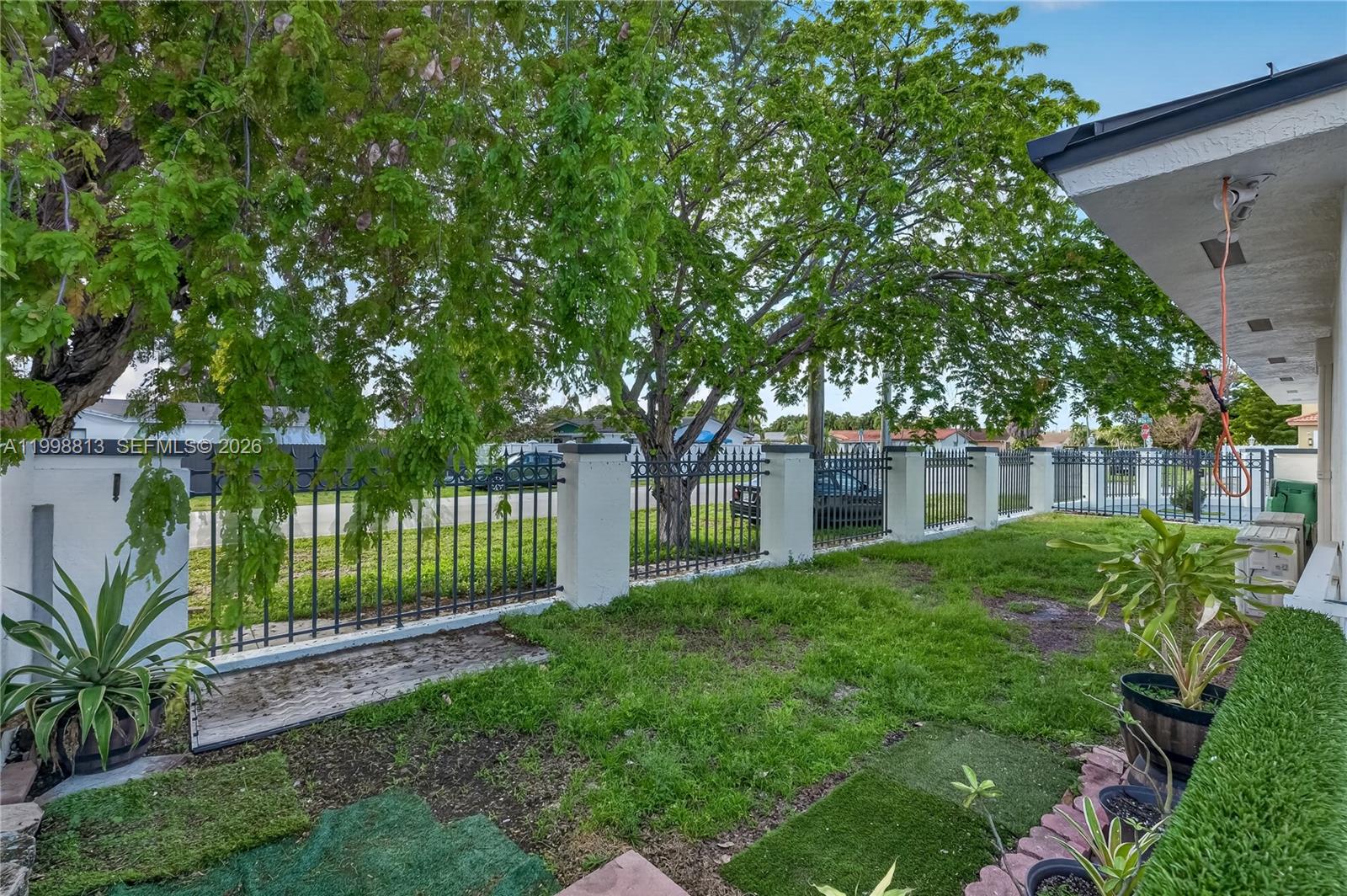 10140 Southwest 26th Terrace Miami, FL 33165 - Photo 62 of 70 a house view with a garden space