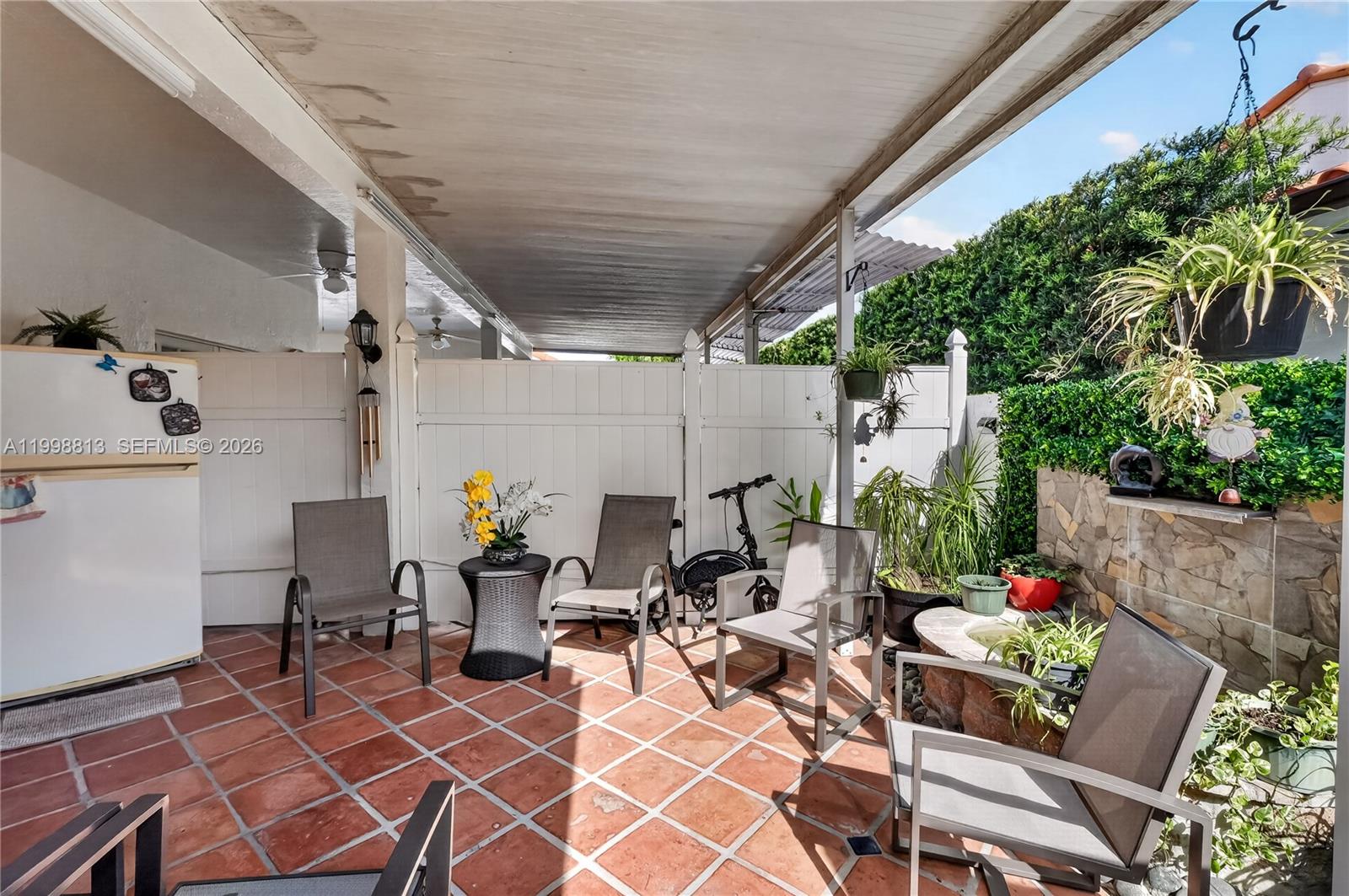10140 Southwest 26th Terrace Miami, FL 33165 - Photo 65 of 70 an outdoor space with furniture