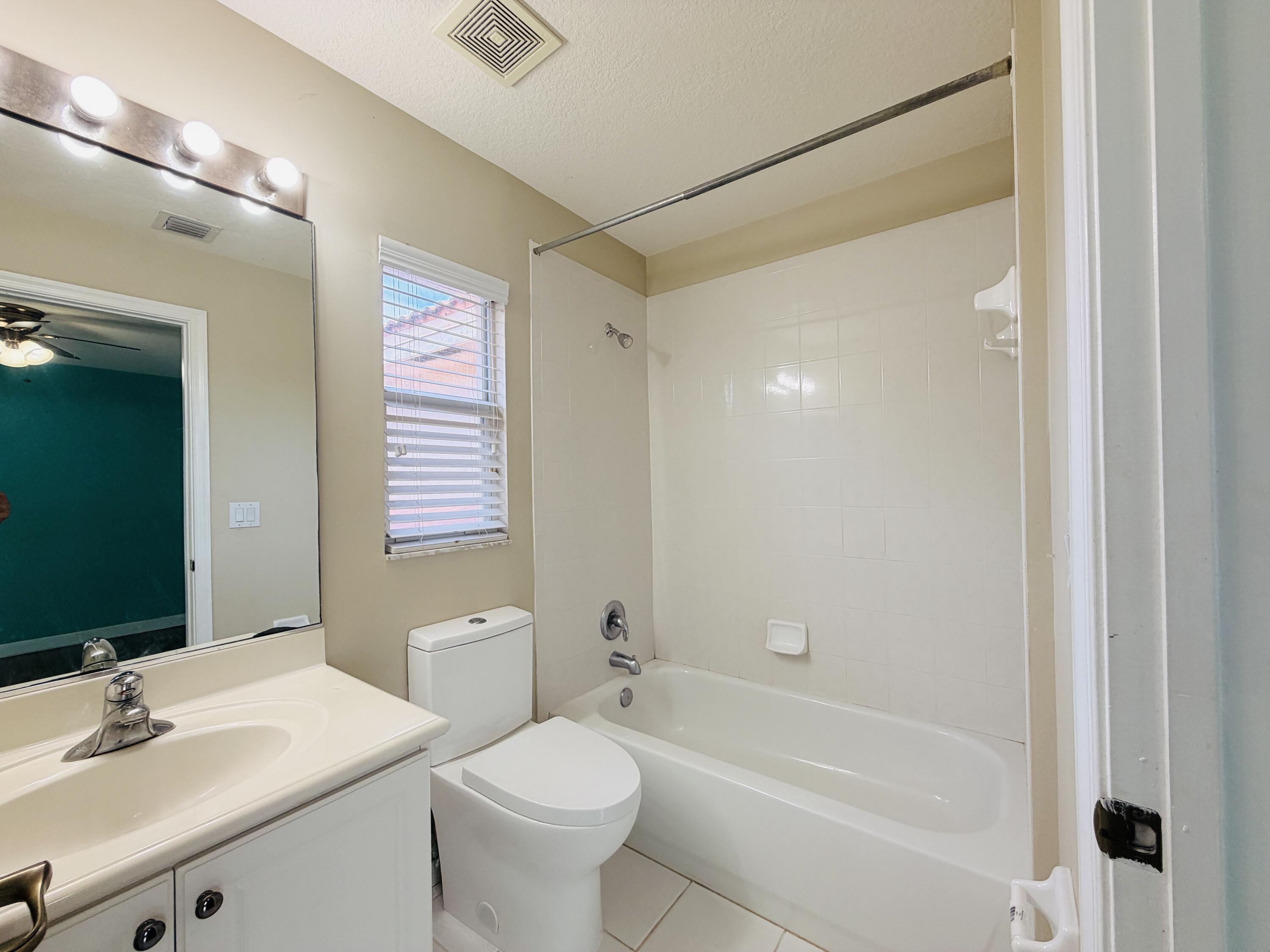 6573 Traveler Road West Palm Beach, FL 33411 - Photo 19 of 25 Second Bedroom Restroom