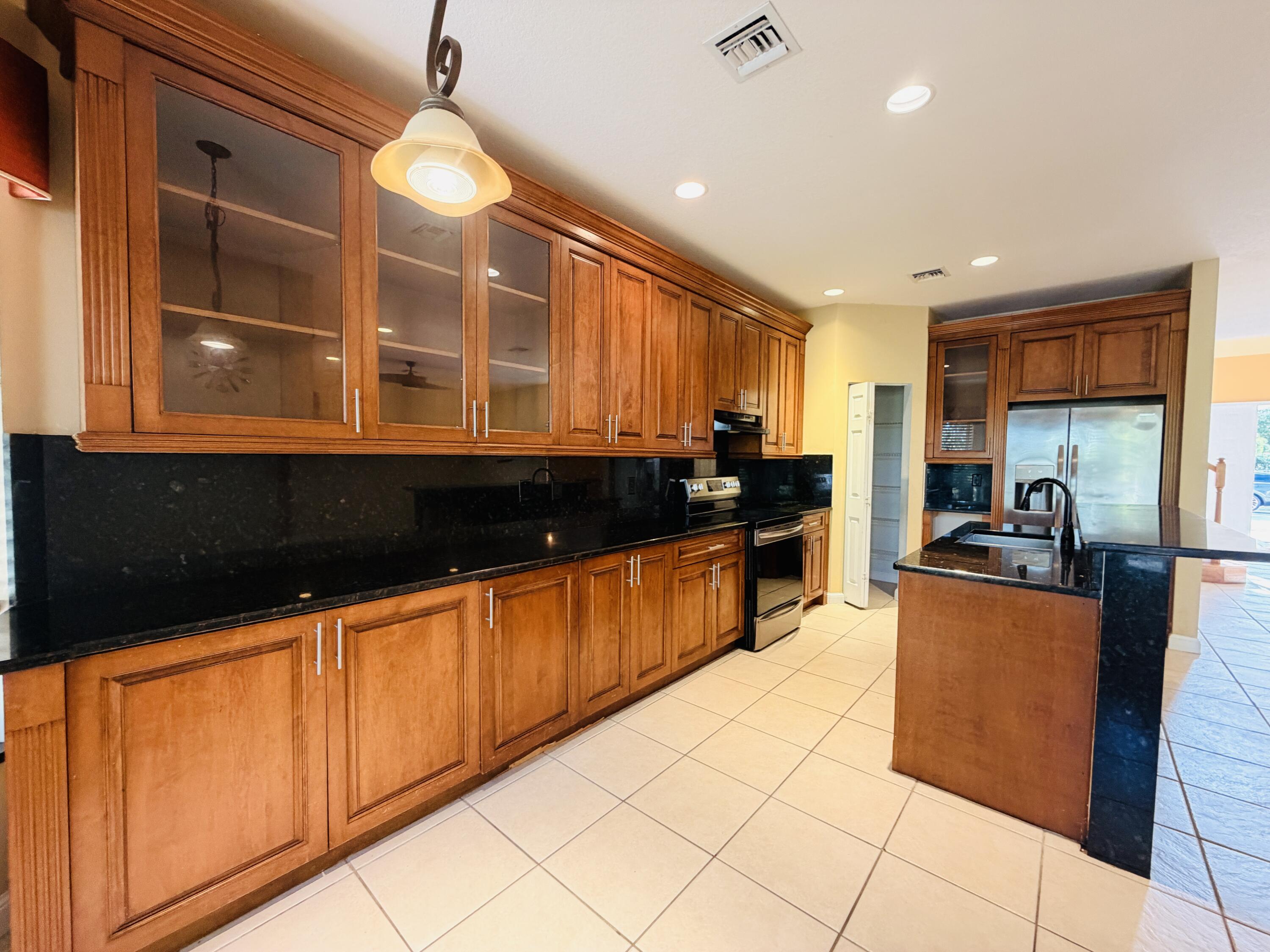 6573 Traveler Road West Palm Beach, FL 33411 - Photo 8 of 25 Kitchen