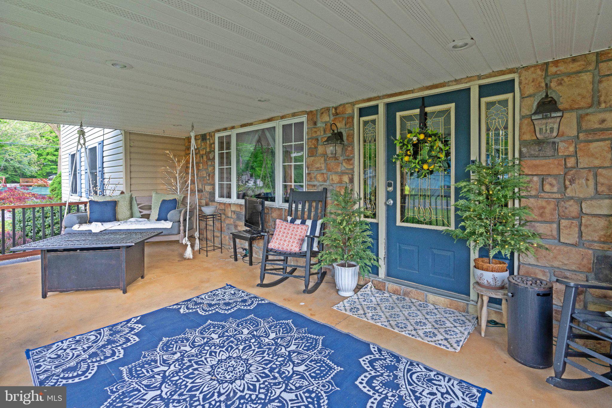 1002 Maple Lane Tyrone, PA 16686 - Photo 5 of 71 Charming porch with inviting decor.