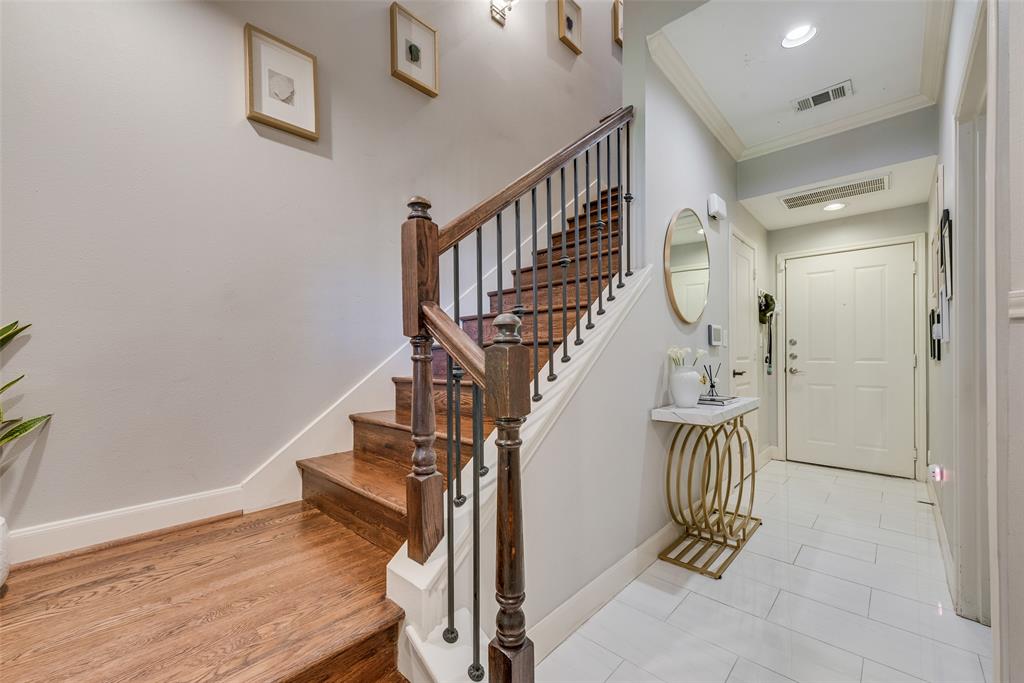 4904 Live Oak Street, Unit 302 Dallas, TX 75206 - Photo 2 of 25 a view of entryway and hall with wooden floor