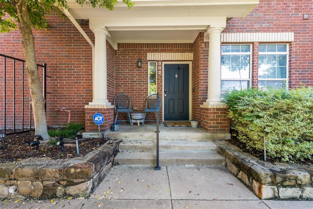 4904 Live Oak Street, Unit 302 Dallas, TX 75206 - Photo 24 of 25 a view of a house with potted plants