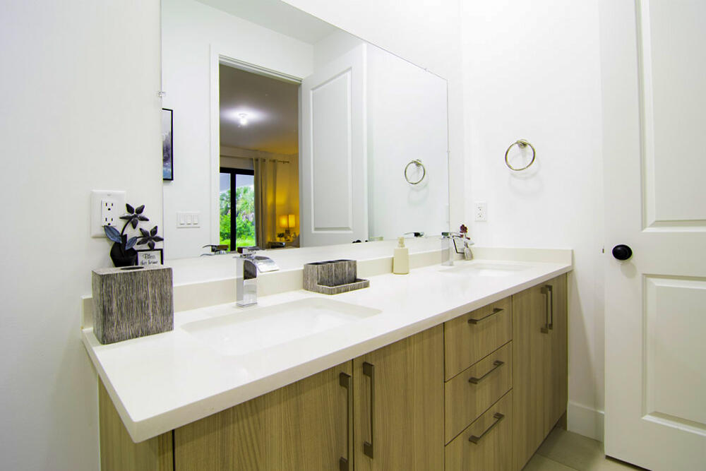 15245 Brainbridge Circle Port Charlotte, FL 33981 - Photo 15 of 52 a bathroom with a sink and a mirror