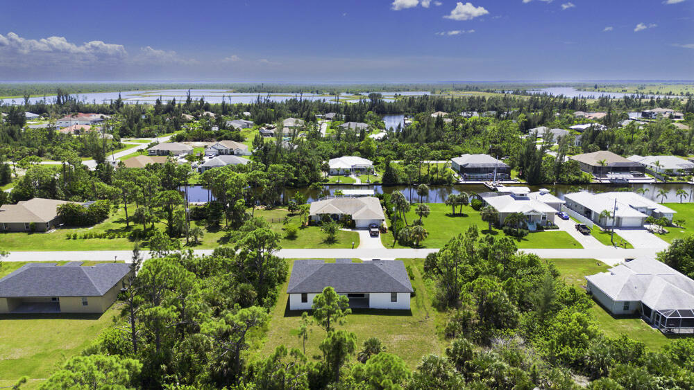 15245 Brainbridge Circle Port Charlotte, FL 33981 - Photo 2 of 52 a view of a city with tall buildings