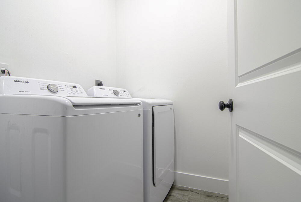 15245 Brainbridge Circle Port Charlotte, FL 33981 - Photo 23 of 52 a utility room with dryer and washer