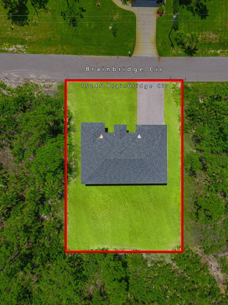 15245 Brainbridge Circle Port Charlotte, FL 33981 - Photo 44 of 52 an aerial view of a tennis court