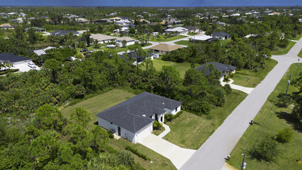 15245 Brainbridge Circle Port Charlotte, FL 33981 - Photo 48 of 52 an aerial view of residential houses with outdoor space