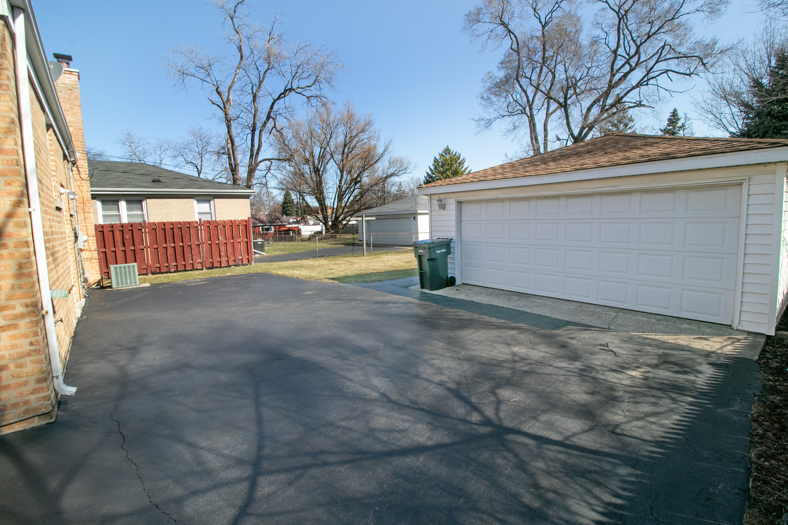 215 Iroquois Road Hillside, IL 60162 - Photo 22 of 26 a view of a yard with a large tree