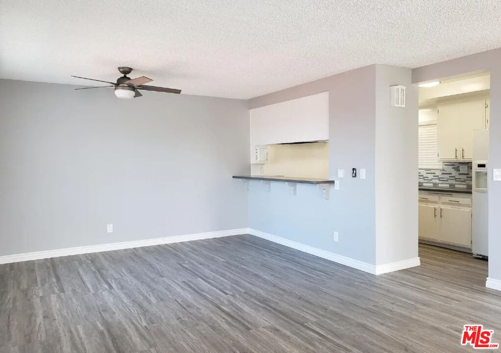 7 Clipper Road Rancho Palos Verdes, CA 90275 - Photo 11 of 20 wooden floor in an empty room with a window