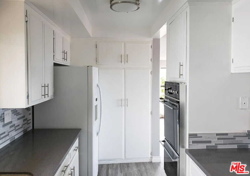 7 Clipper Road Rancho Palos Verdes, CA 90275 - Photo 14 of 20 a view of kitchen with refrigerator and cabinets