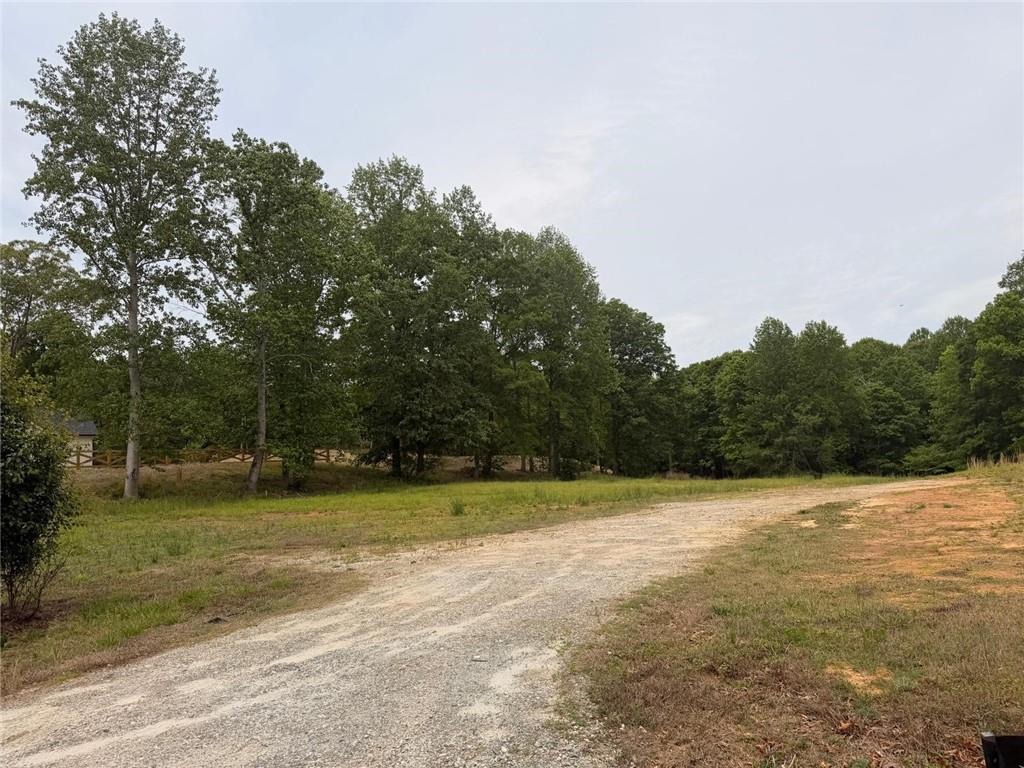 405 Cooper Bridge Road Braselton, GA 30517 - Photo 4 of 6 a view of a tennis court