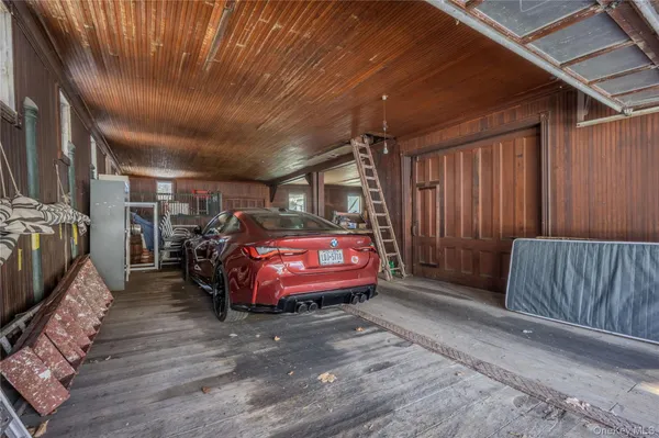 a view of a hallway with storage