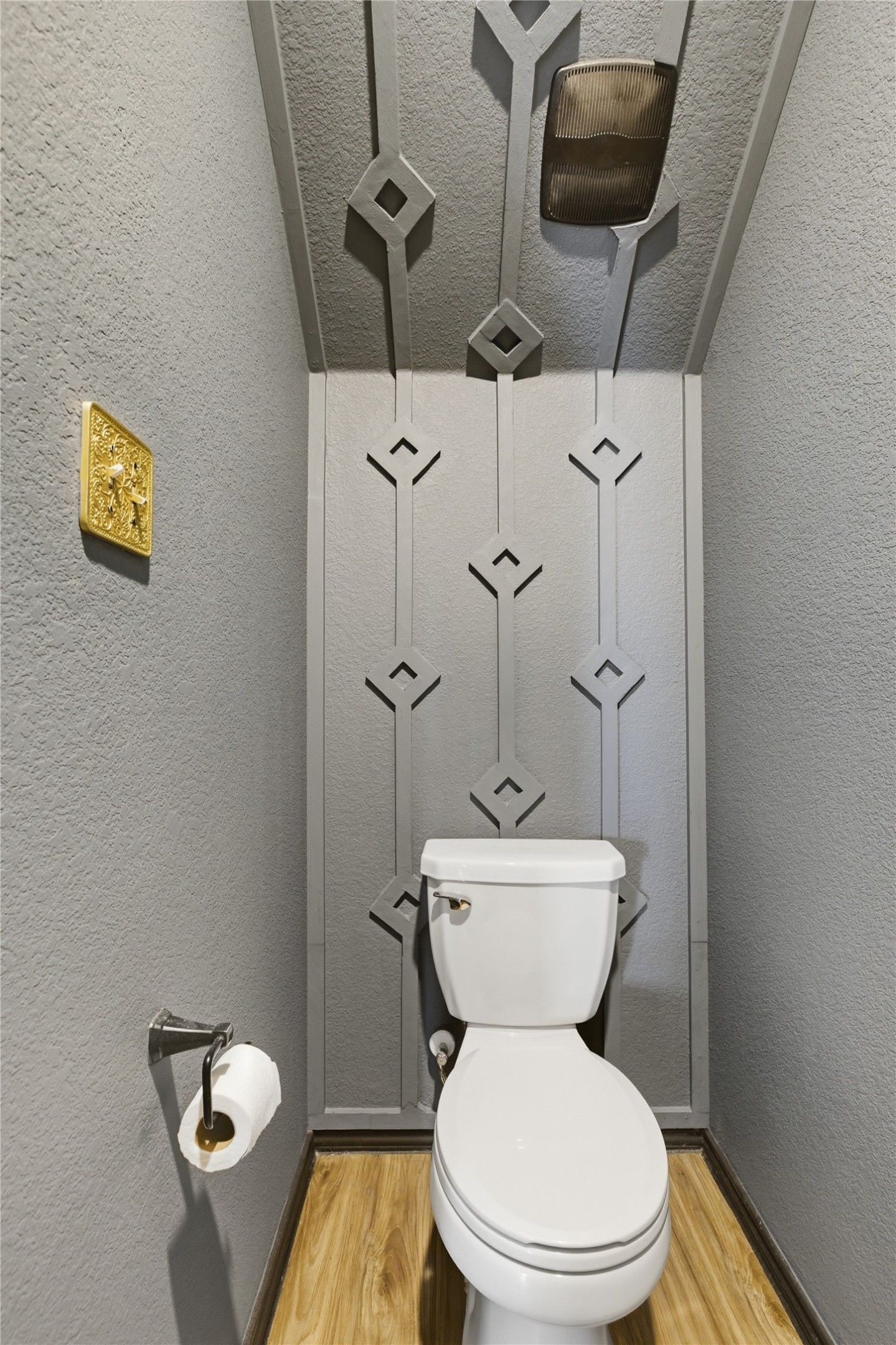 116 Night Riders Way Jarrell, TX 76537 - Photo 9 of 40 Powder room featuring wood-finish flooring and a white toilet